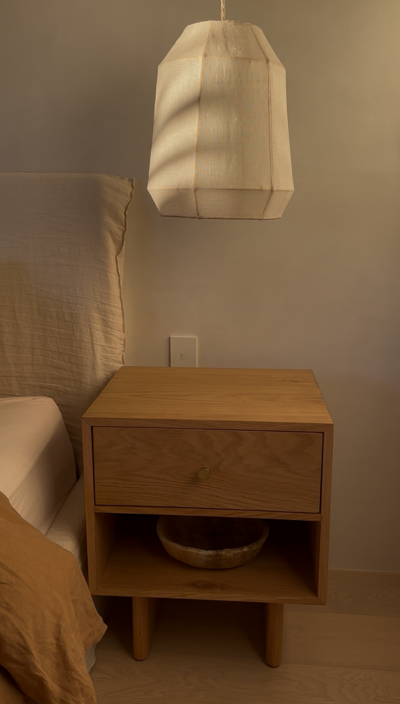 comma  bedside table styled in a modern bedroom comma  bedside table styled in a modern bedroom