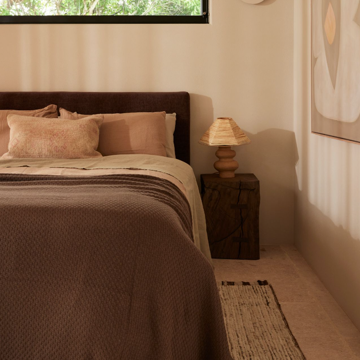 Cosmos Bedhead in Mocha fabric, styled in a modern bedroom with bedding. Cosmos Bedhead in Mocha fabric, styled in a modern bedroom with bedding.
