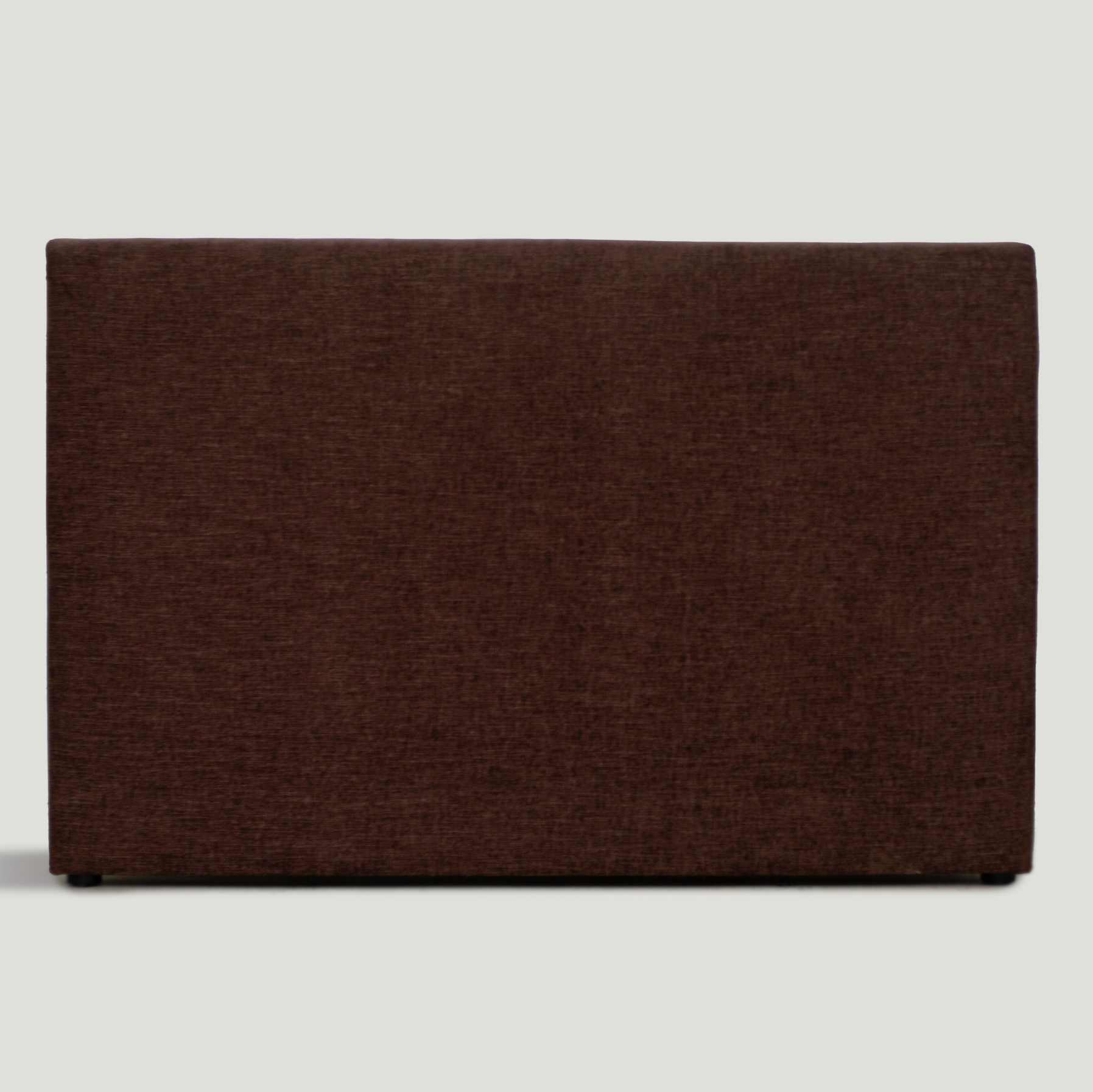 Upholstered Cosmos Bedhead in Mocha fabric, front view showing soft rectangular silhouette. Upholstered Cosmos Bedhead in Mocha fabric, front view showing soft rectangular silhouette.