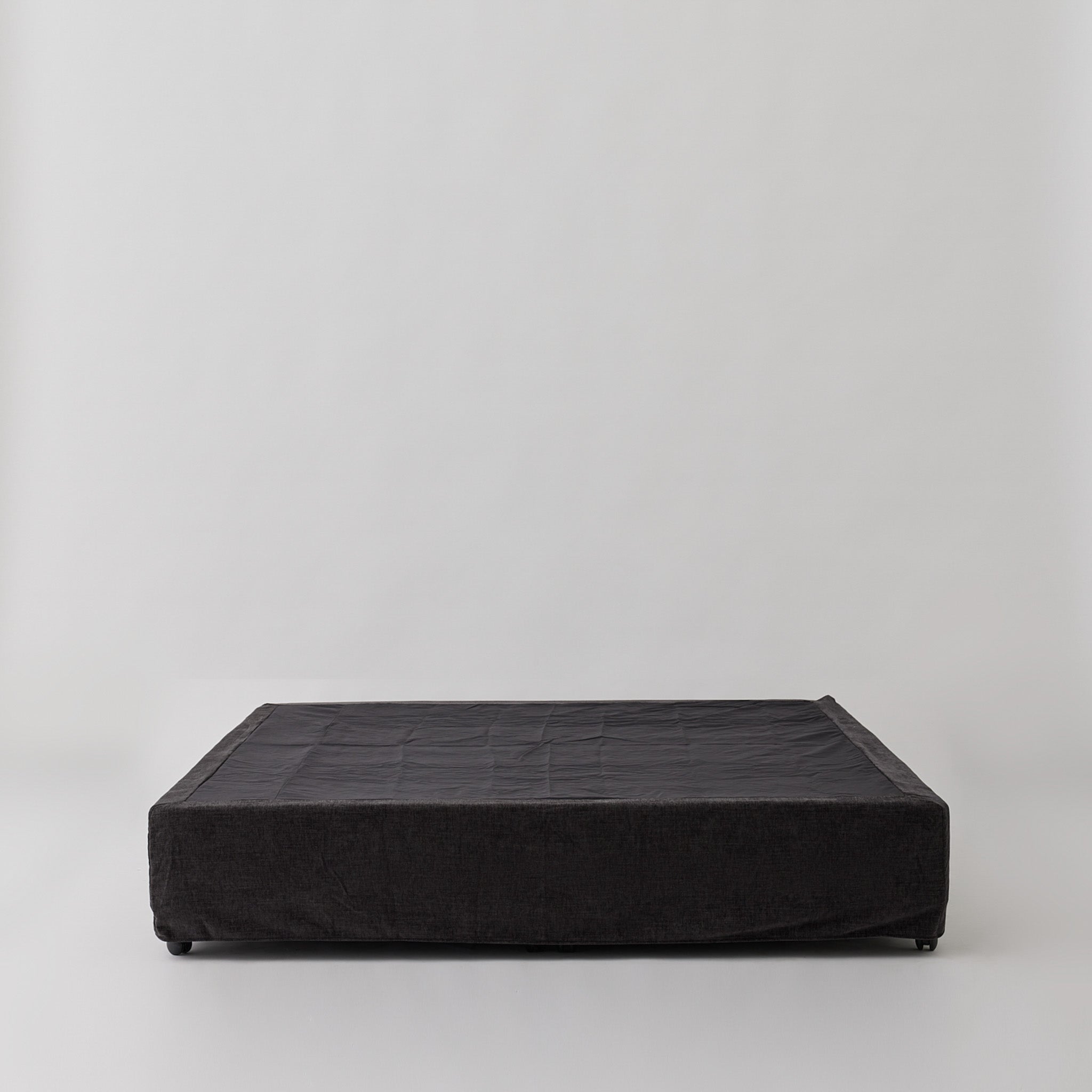 Cosmos Valance cover in Charcoal fabric, neatly fitted over a Queen bed base. Cosmos Valance cover in Charcoal fabric, neatly fitted over a Queen bed base.