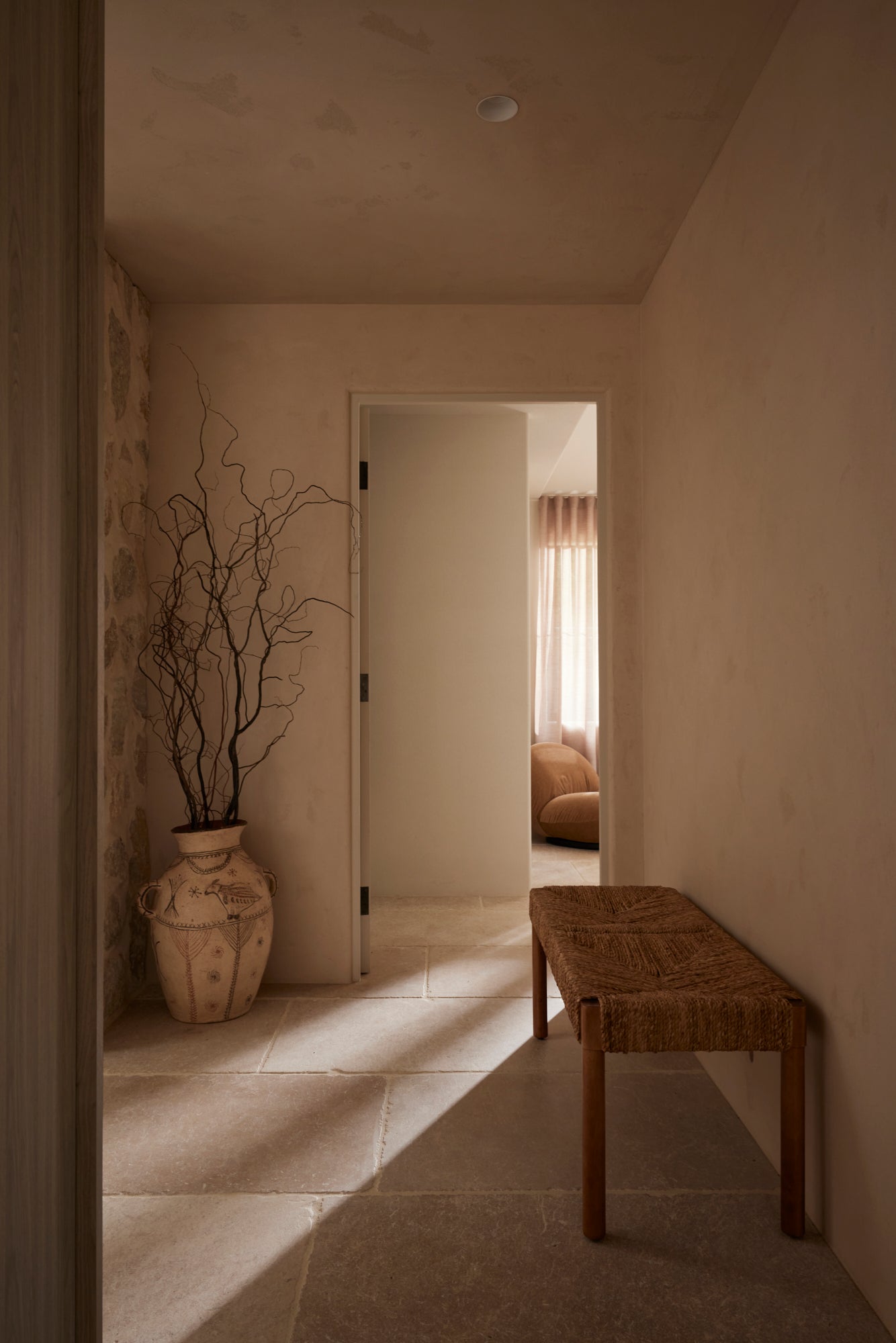 Azul rope-weave bench featured in a hallway