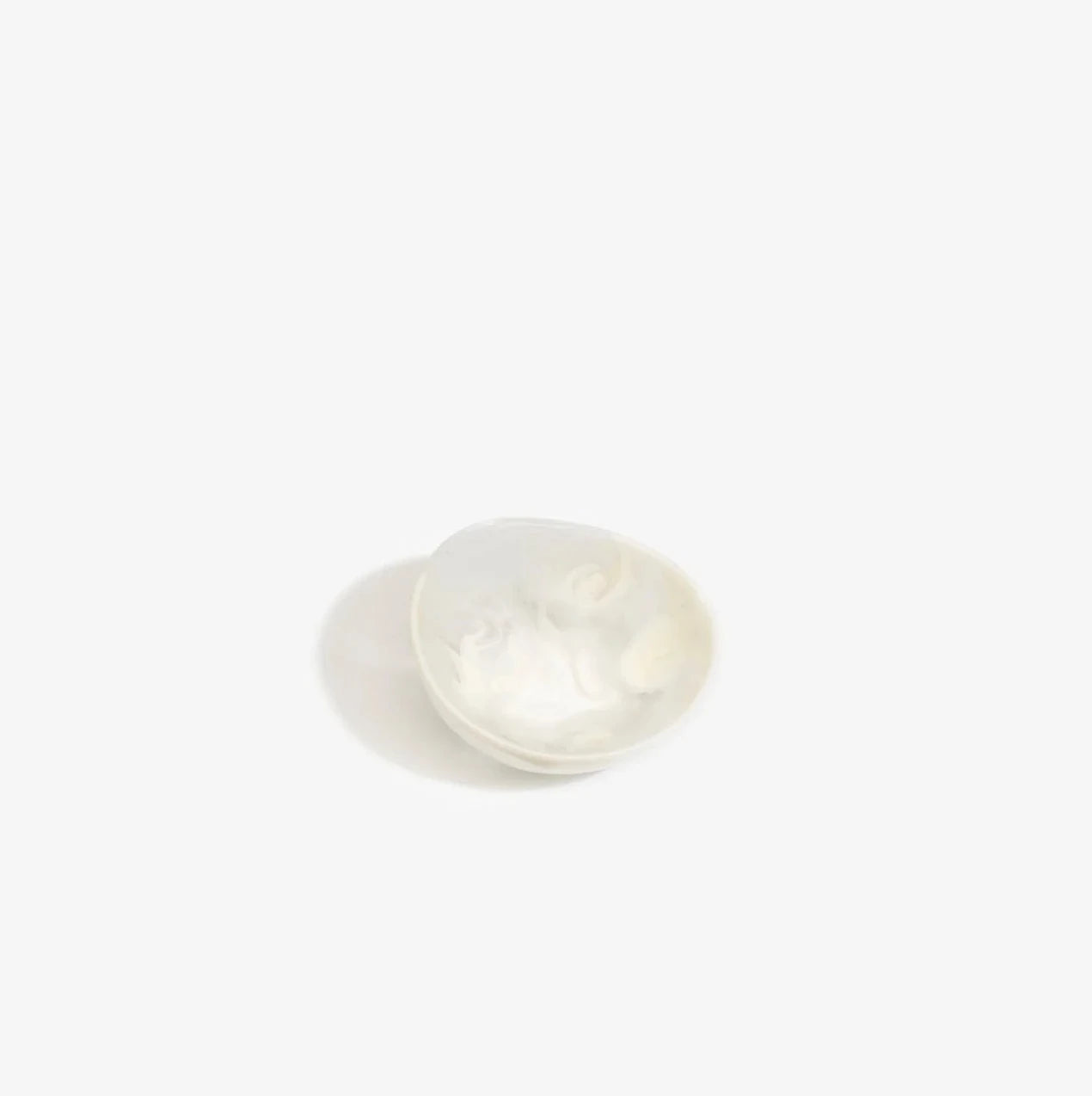 Dinosaur Designs Flow Spice Dish in Swirl Chalk resin with curved organic shape.