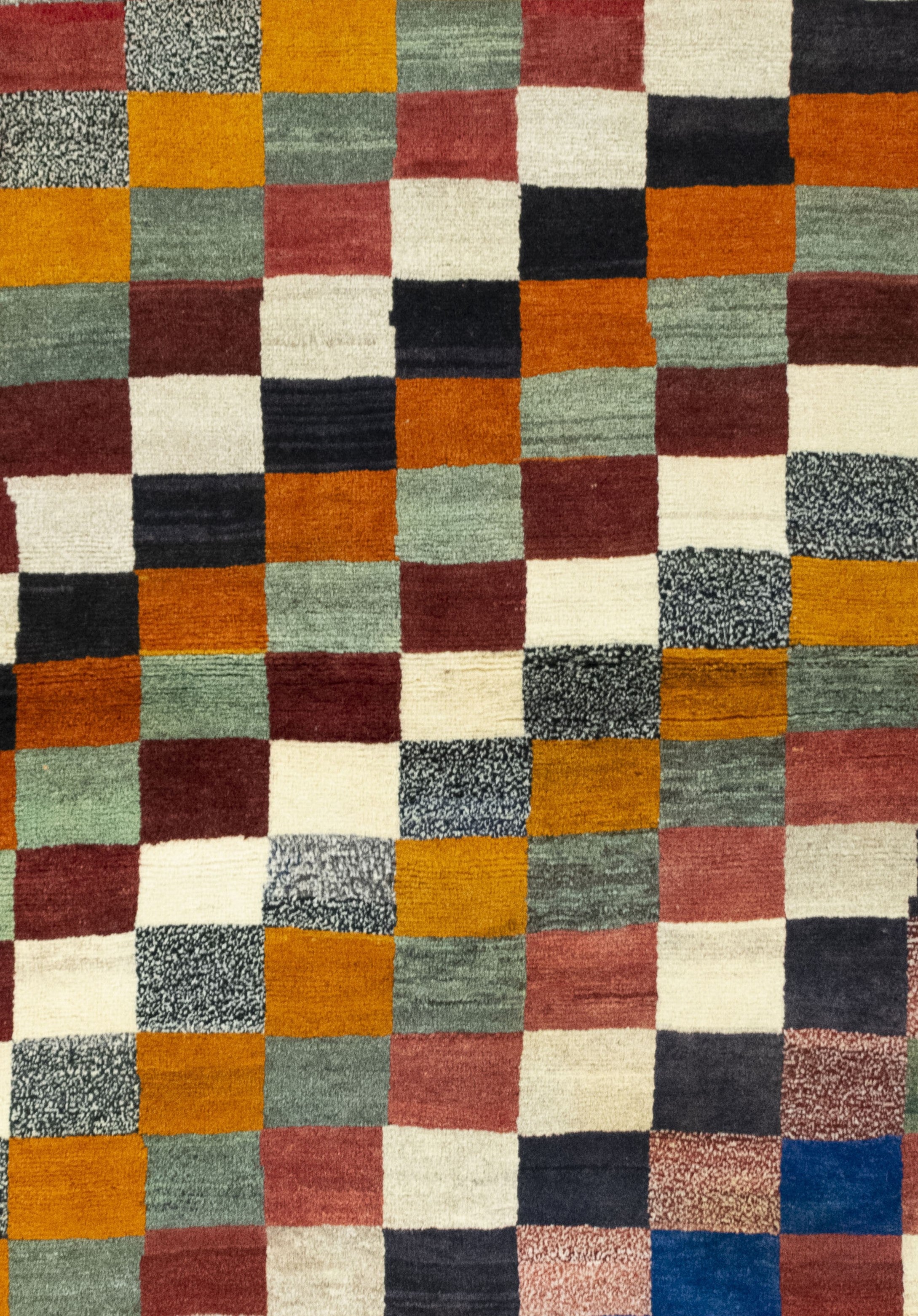 Close-up of handwoven antique Persian Gabbeh rug texture