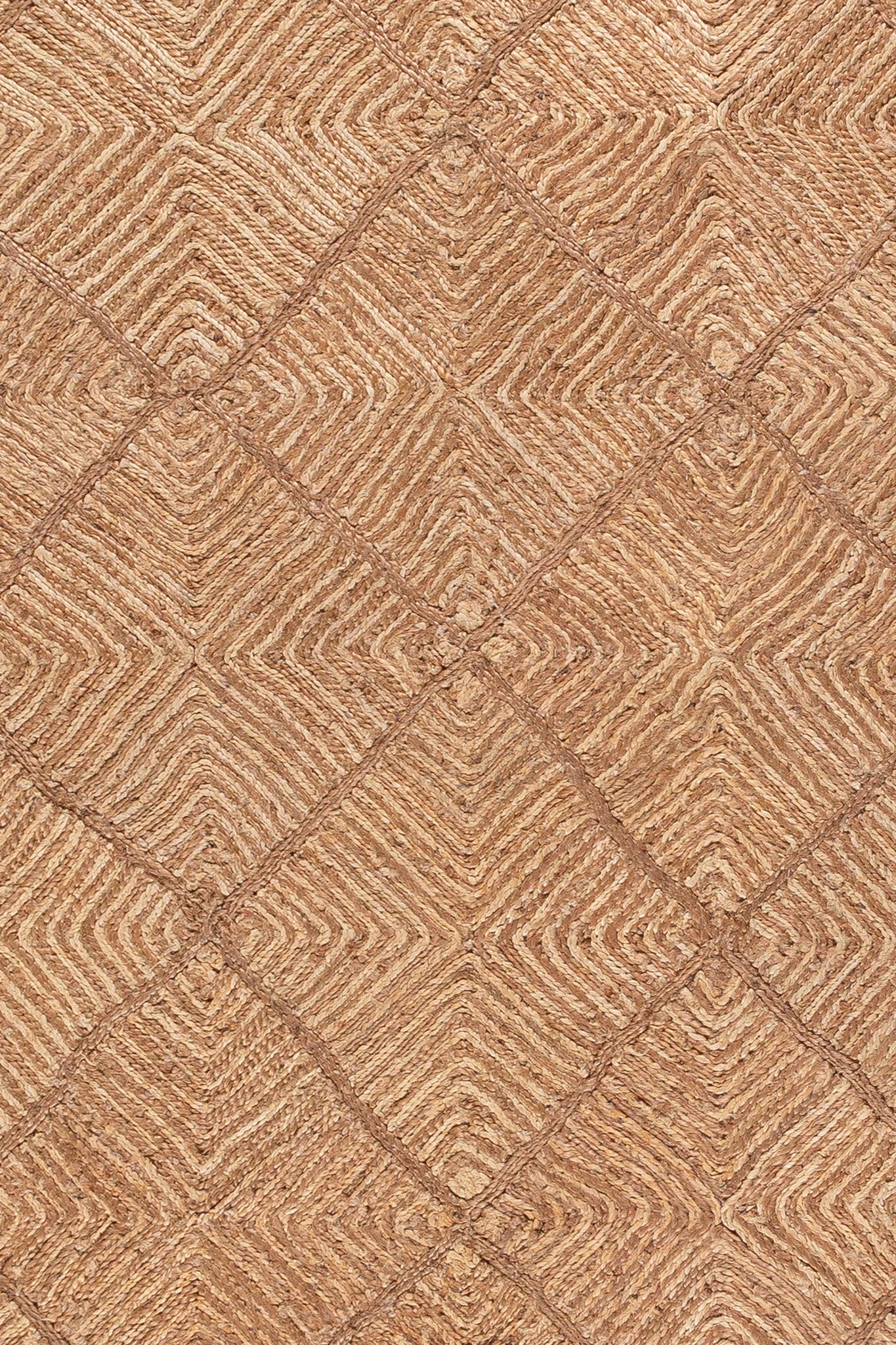 Close-up of handwoven jute rug with geometric diamond pattern and natural texture