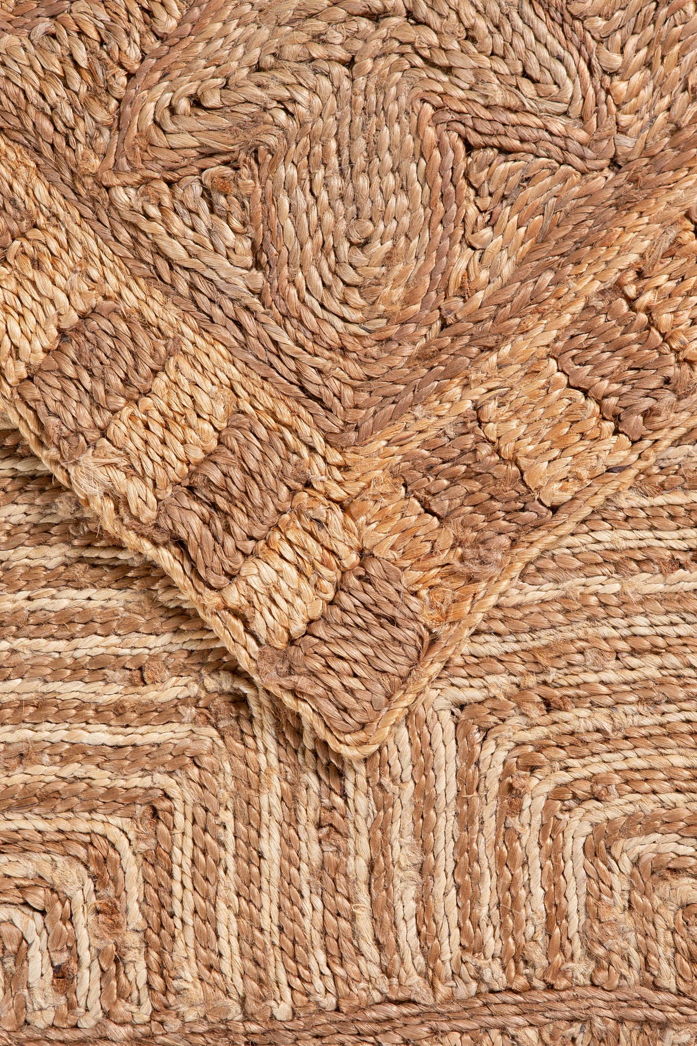 Detail of natural jute Tuareg rug showing woven texture and geometric pattern