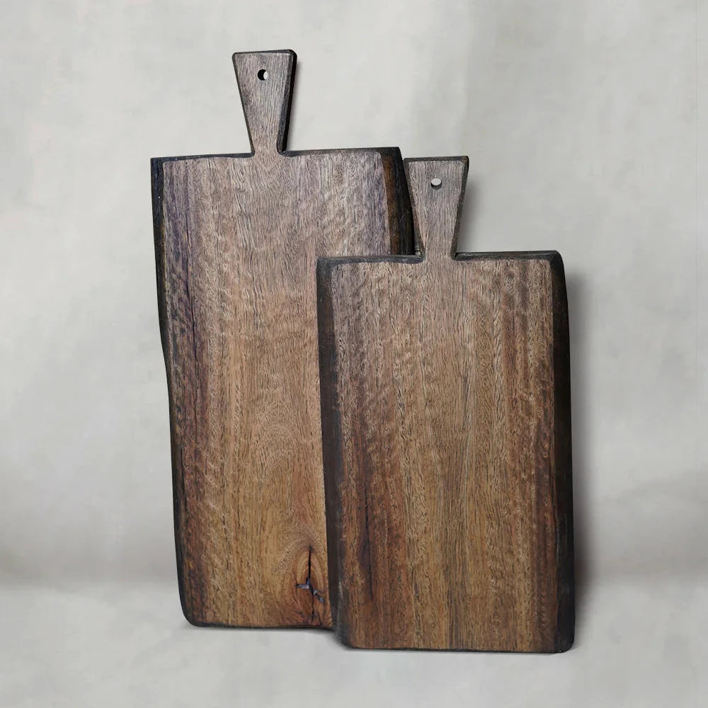 Two natural recycled hardwood chopping boards in varying sizes, showing live-edge grain and smooth oiled surfaces 