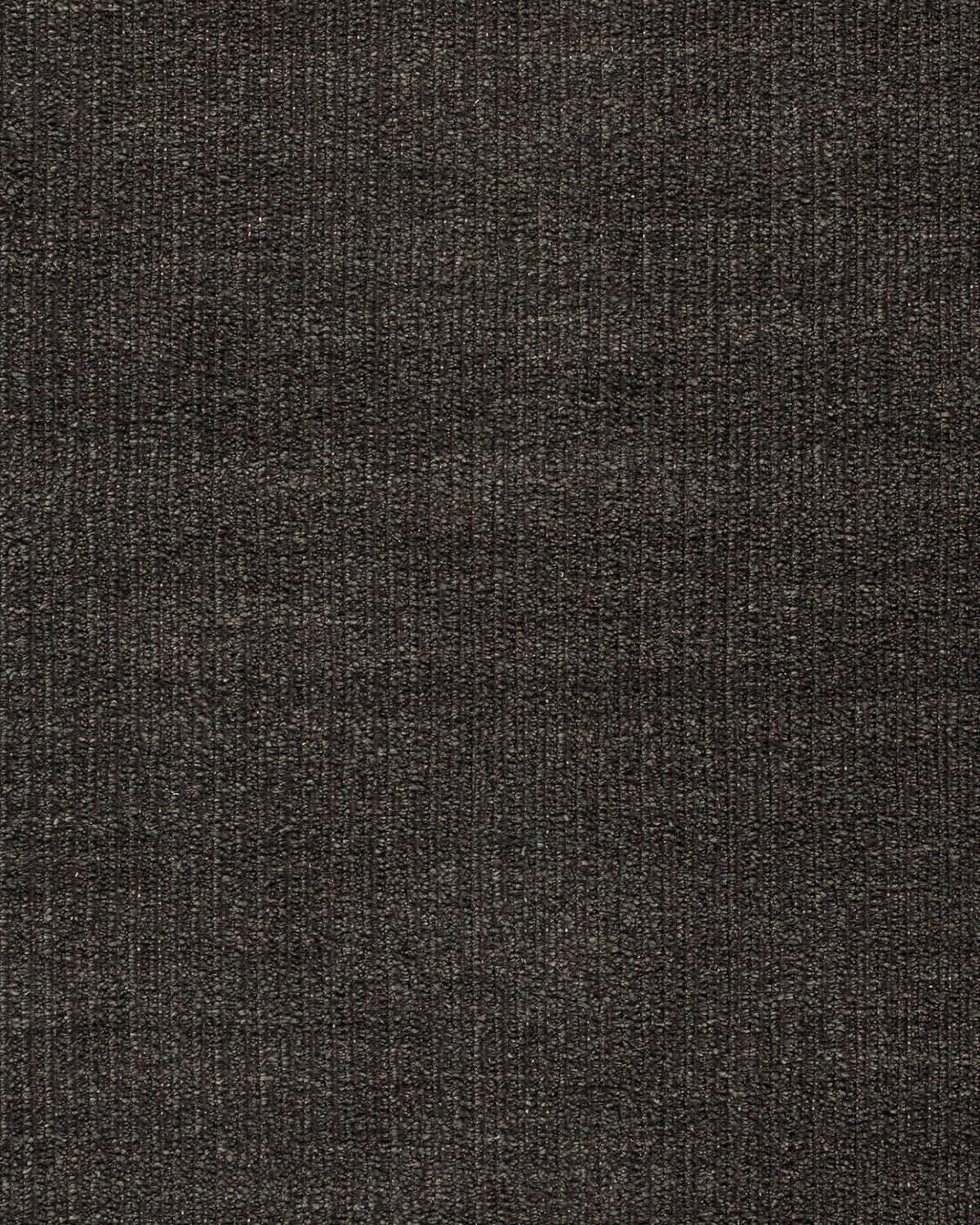 Close-up of the Charcoal Knots Rug showing handspun wool and boucle-like texture.