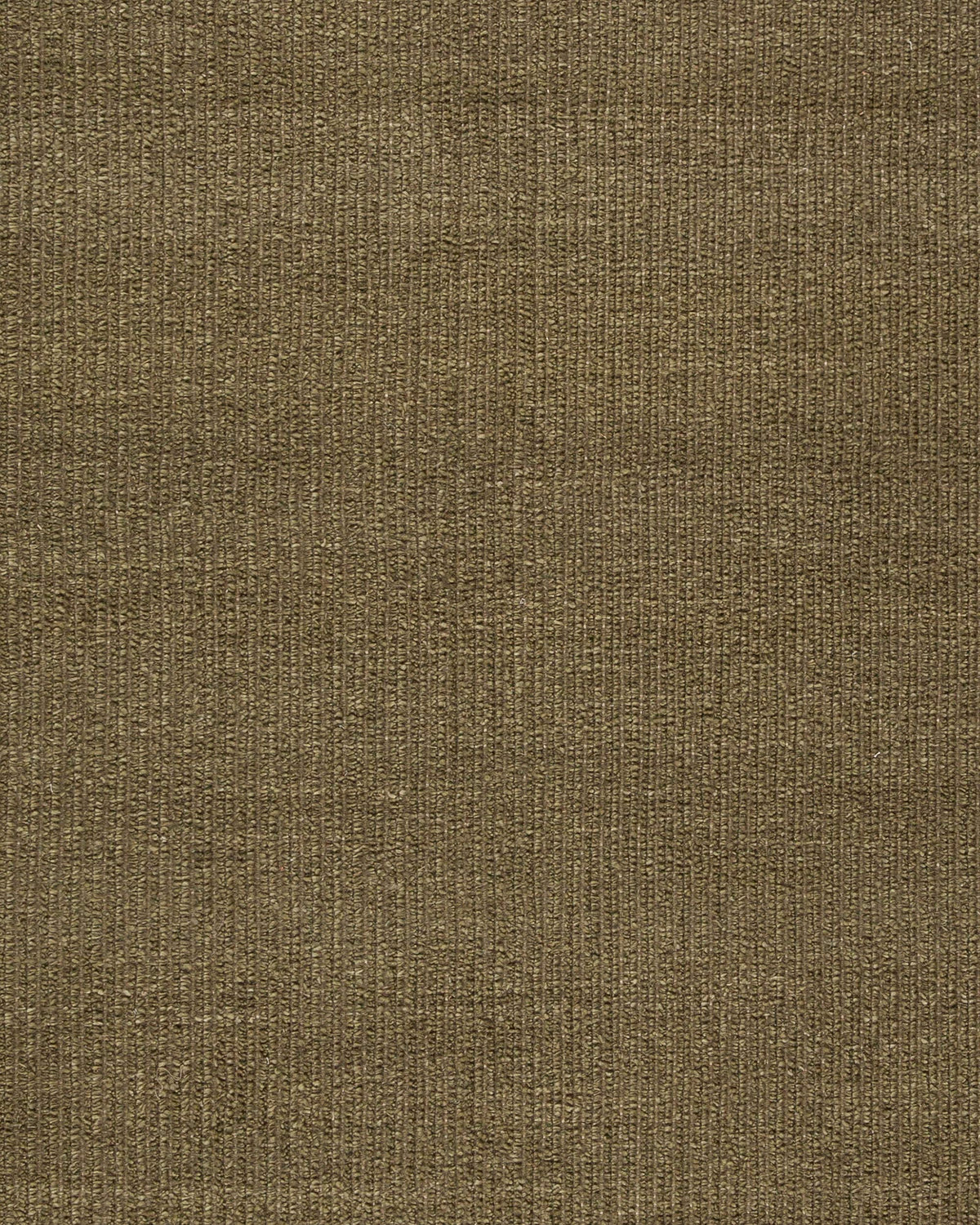 Close-up of Forest Knots Rug – natural handspun wool rug with boucle-like texture in warm forest green.