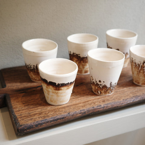 Handmade Obvara espresso cups with smoky glaze finish, unique ceramic by Mullumbimby artist Jacqui Sosnowski.