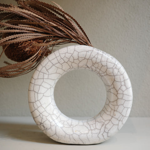 Unique handmade glazed Raku circle vase with crackled finish by Mullumbimby ceramicist Jacqui Sosnowski.