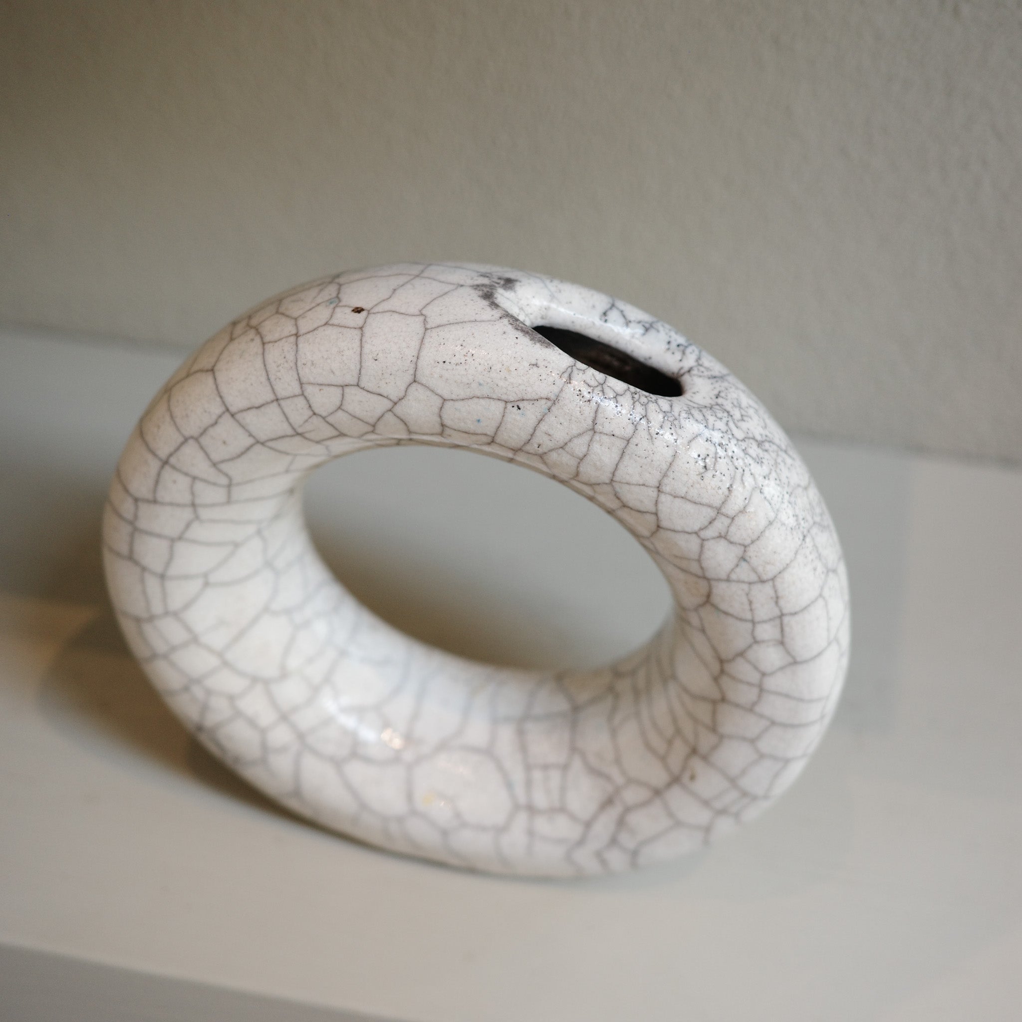 Round ceramic Raku vase with glazed crackle finish, artisan handmade in Australia.