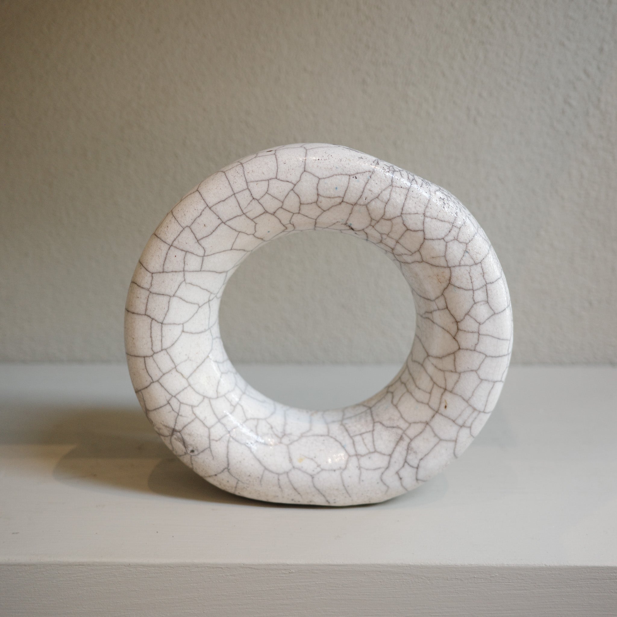 Unique handmade glazed Raku circle vase with crackled finish 