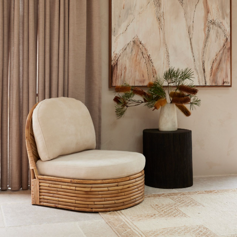 Pablo Rattan Armchair styled in a natural modern interior setting