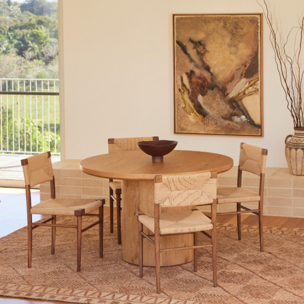 Azul dining chairs styled around the Alta round dining table in natural Oak