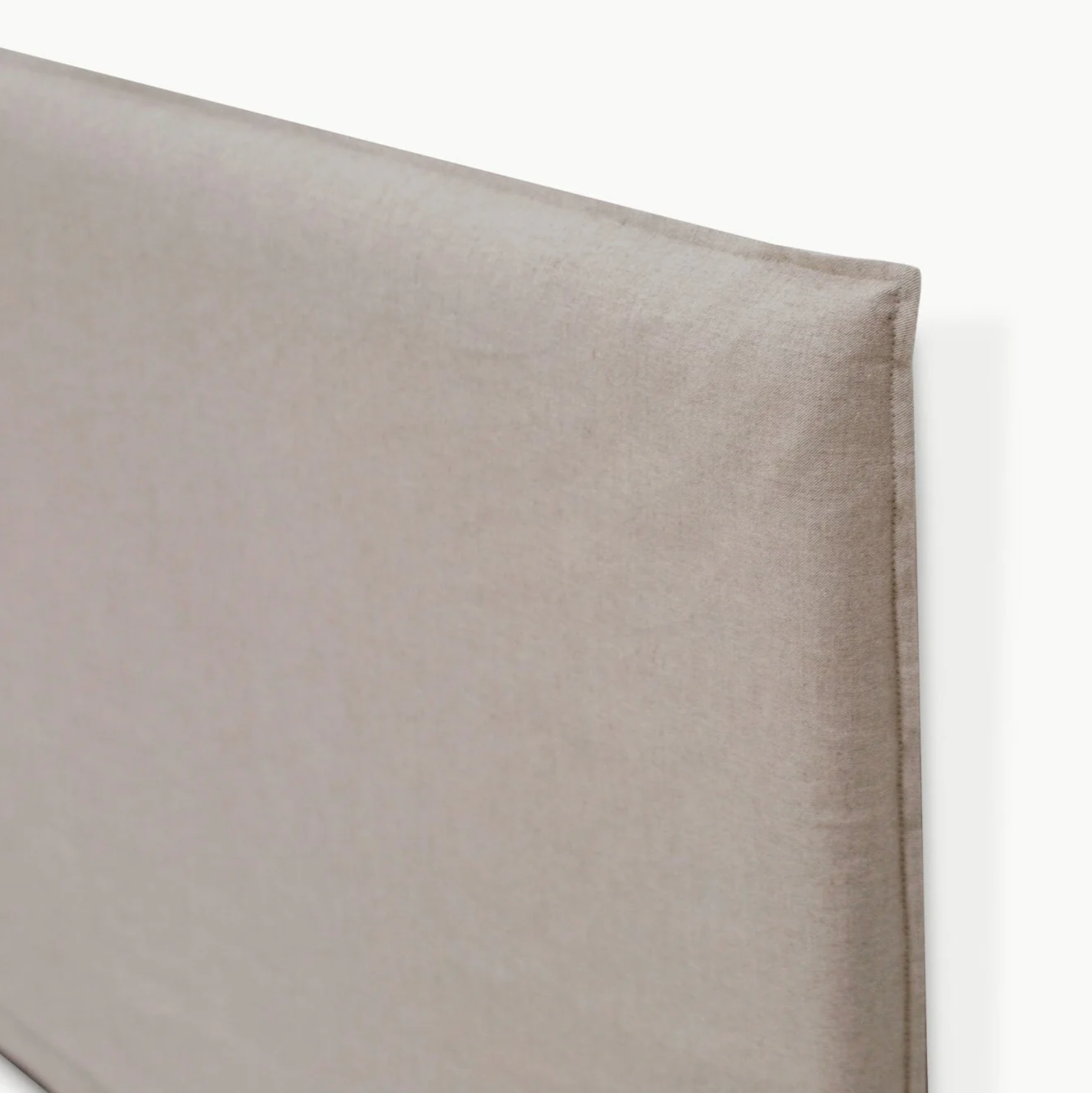 Close-up of Ayla bedhead showing removable linen–cotton loose cover in Beige linen colour.
