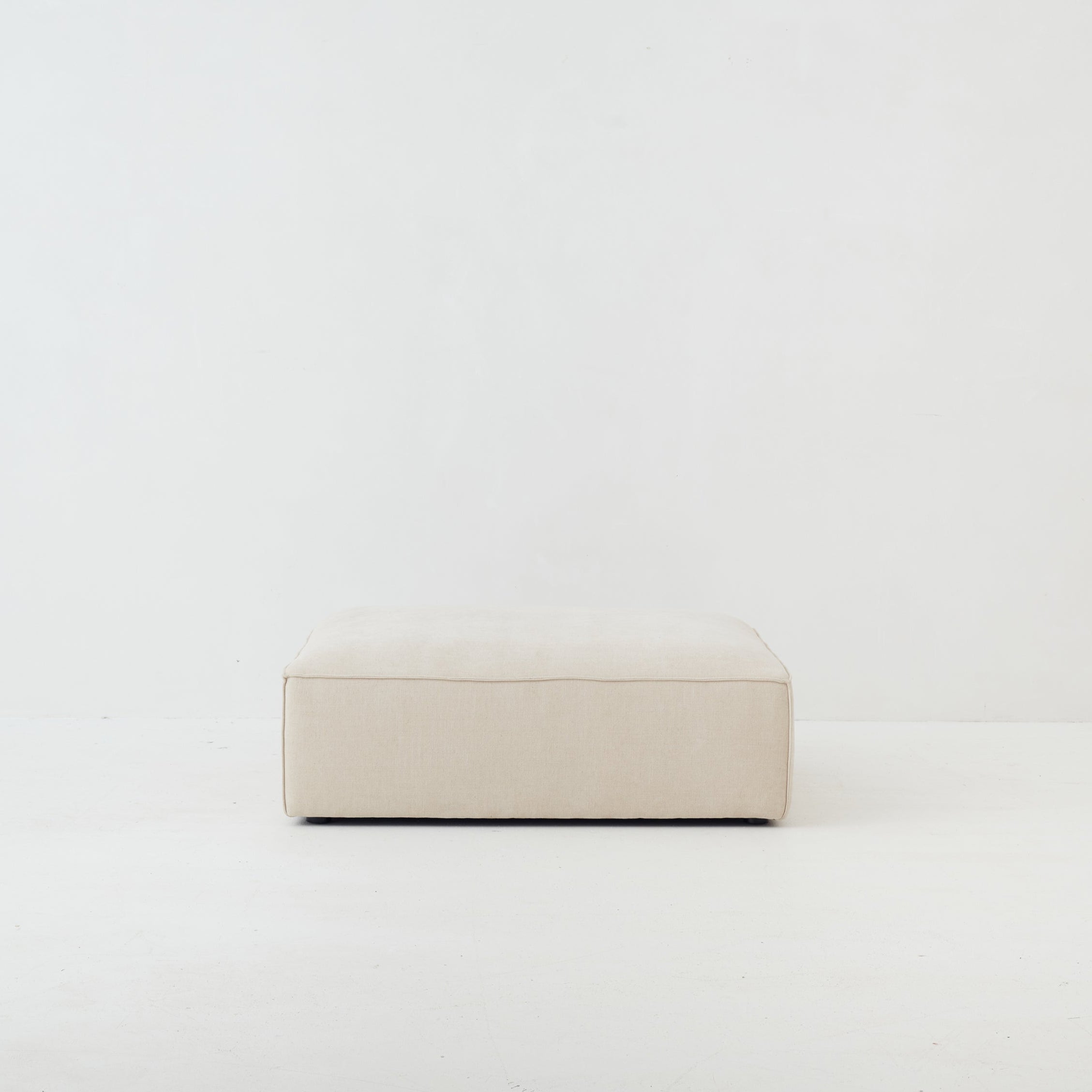 Cosmos Ottoman upholstered in Oatmeal - modular design