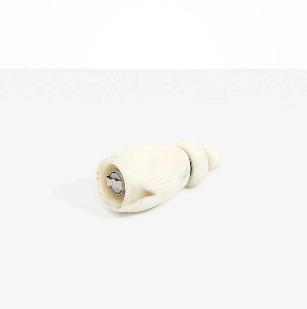Dinosaur Designs Boulder Pepper Grinder in Swirl Chalk resin with sculptural pebble shape.