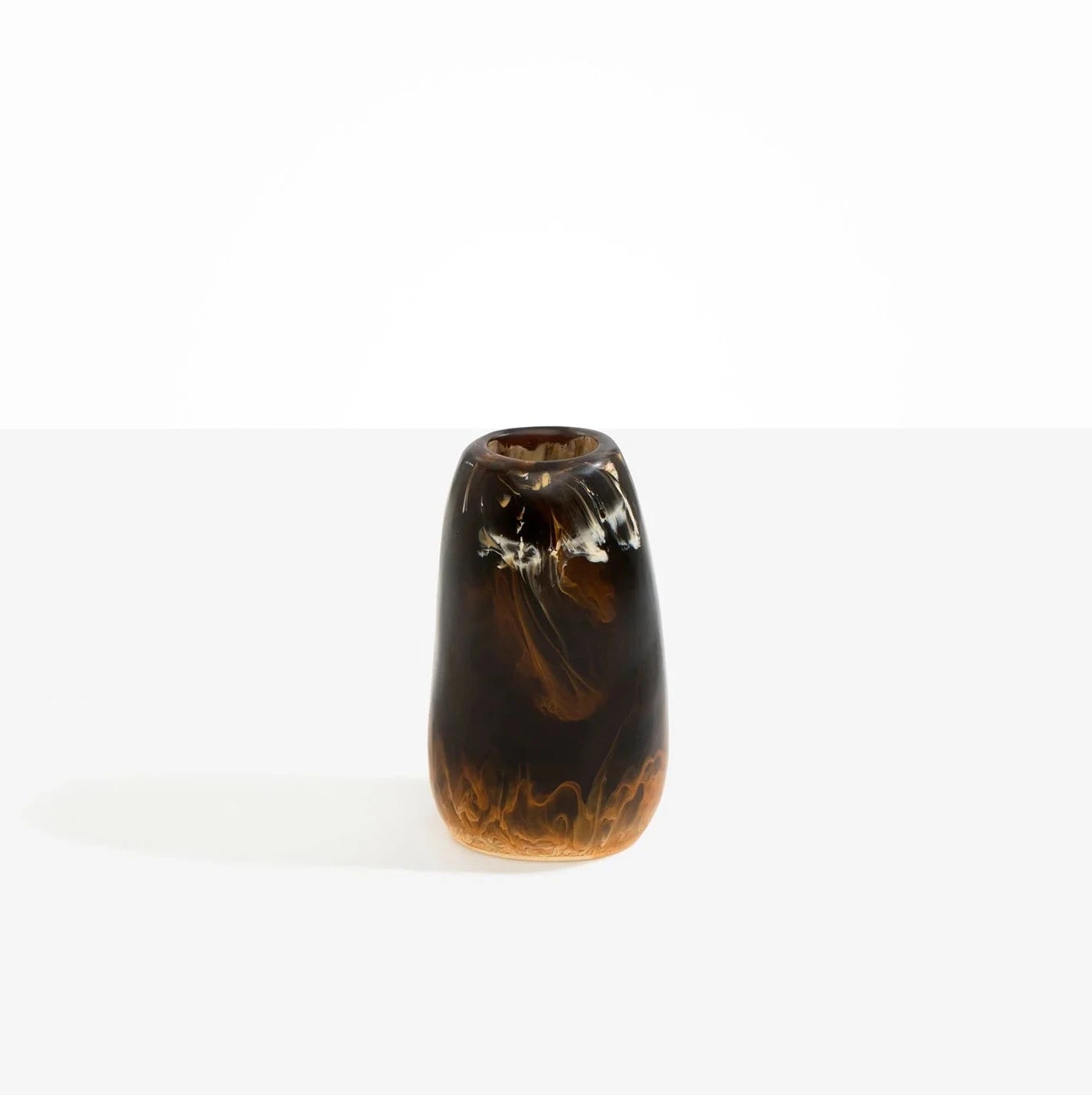 Dinosaur Designs Small Pebble Vase in Dark Horn resin with organic pebble shape.