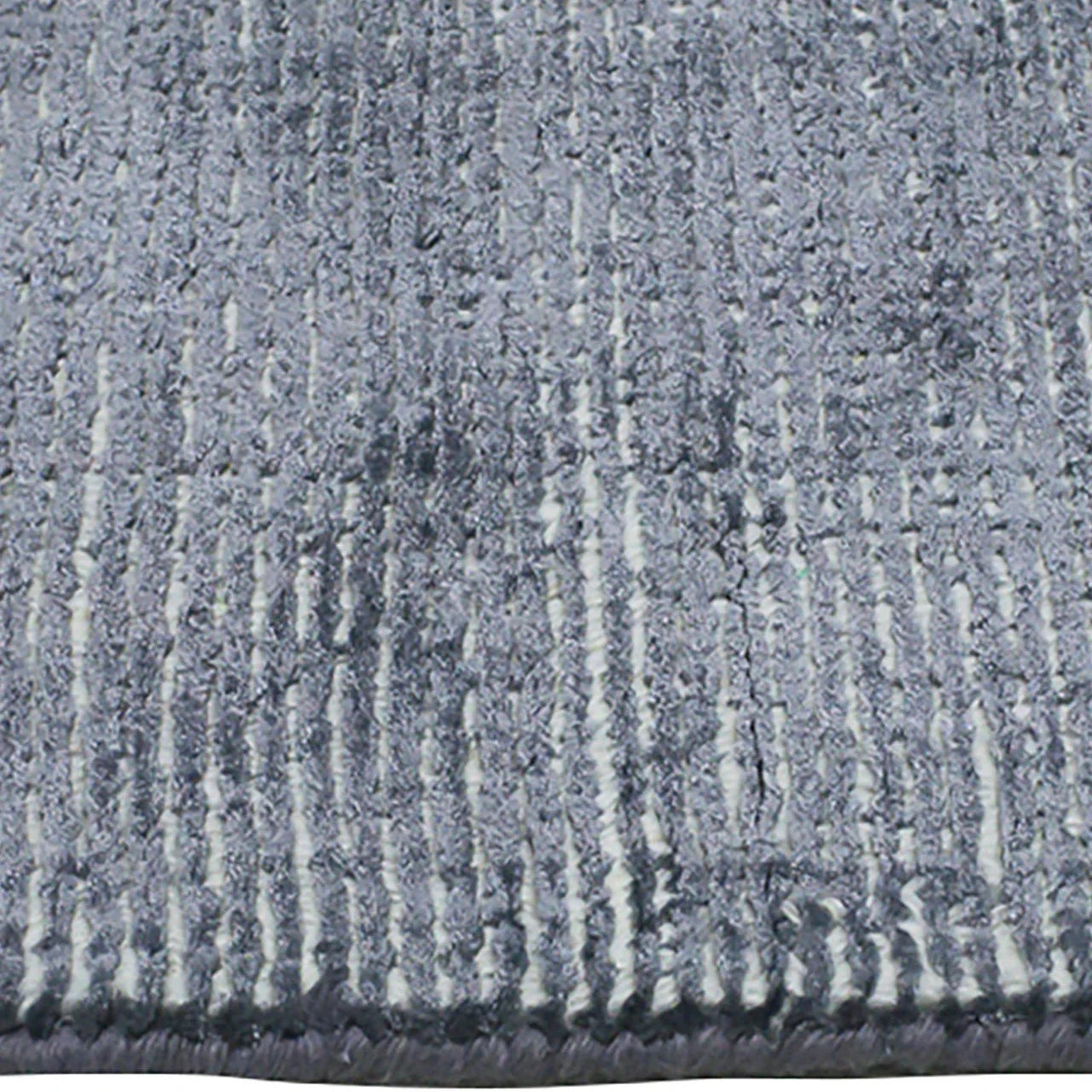 Details of Blue Elements Rug – handwoven wool and bamboo silk rug with textured cut-and-loop, hand-sheared finish.