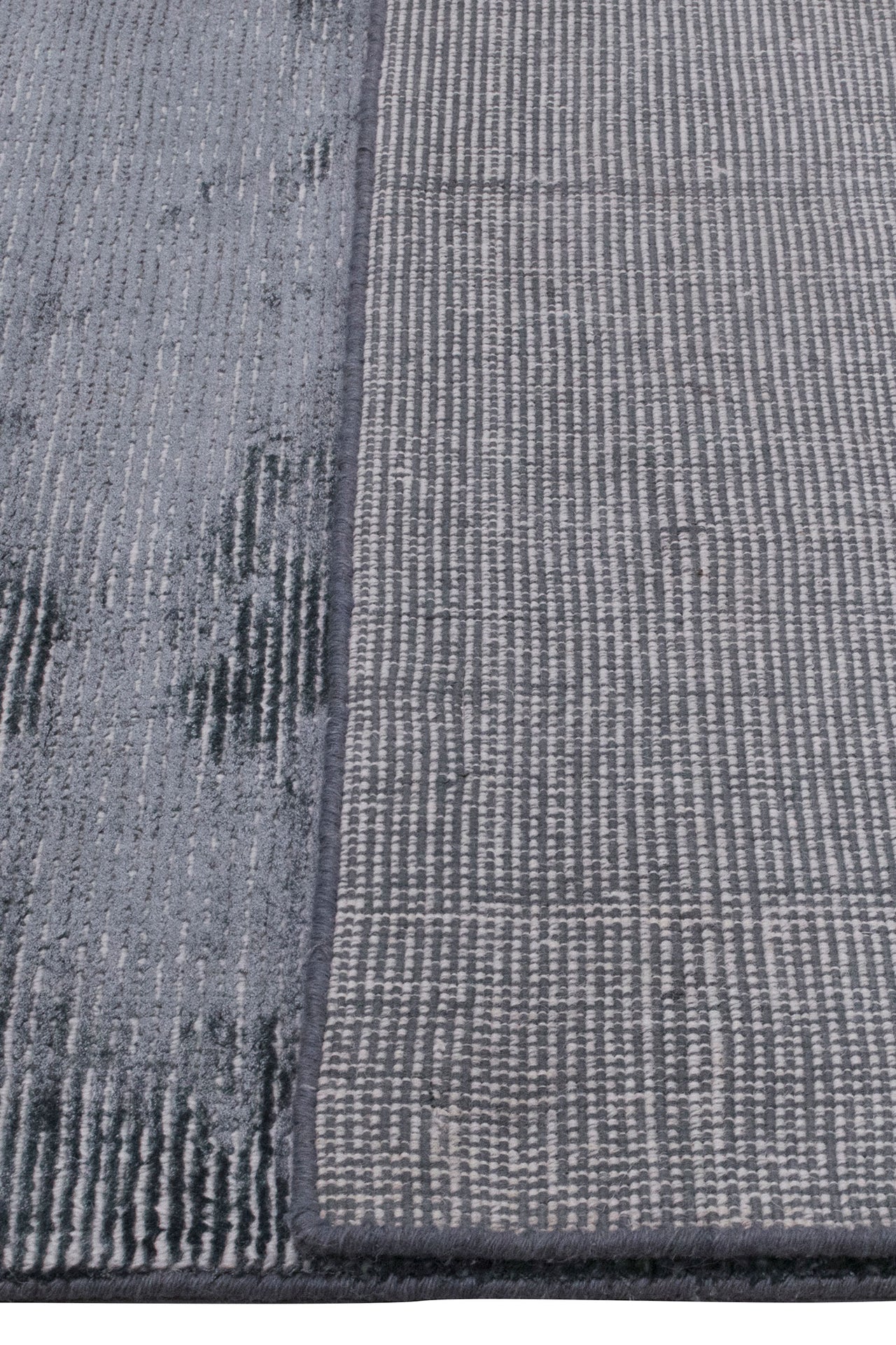 Back of Blue Elements Rug – handwoven wool and bamboo silk rug with textured cut-and-loop, hand-sheared finish.