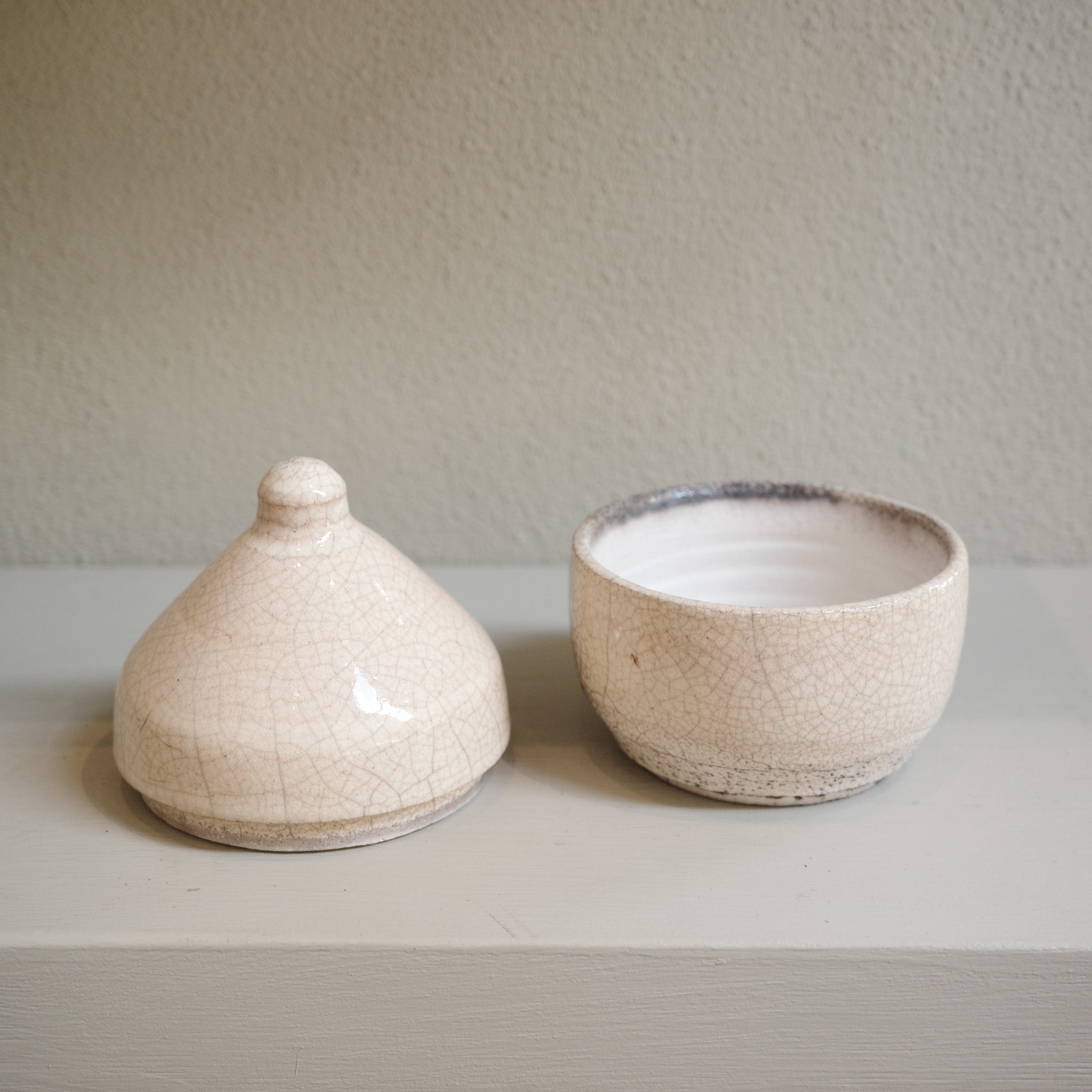Handmade glazed Raku canister with domed lid and crackle finish by Mullumbimby artist Jacqui Sosnowski.