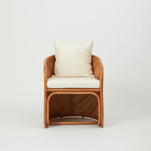 Grace rattan dining chair featured in the cotton/linen Cream fabric
