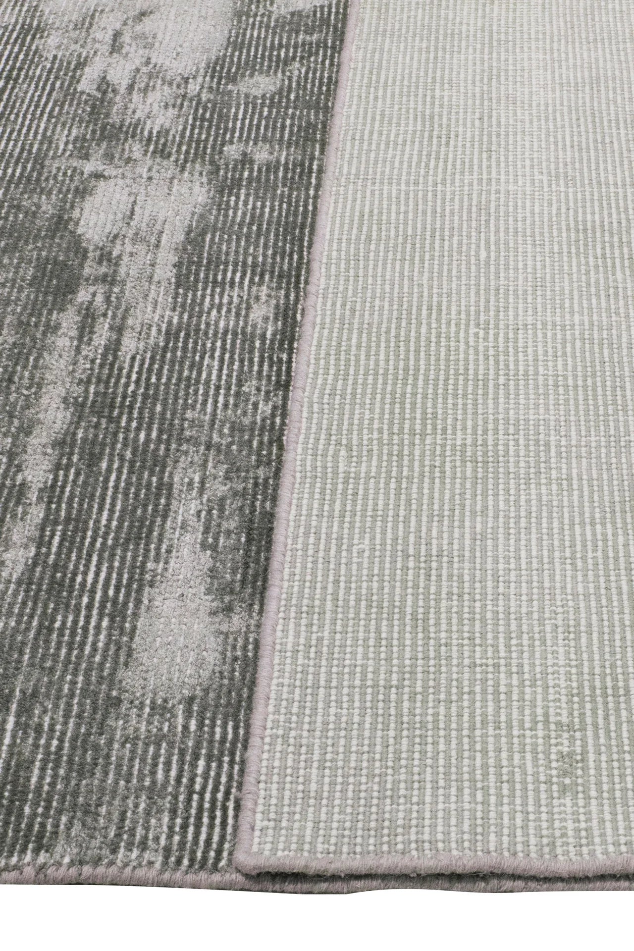 Back of Grey Elements Rug – handwoven wool and bamboo silk rug with textured cut-and-loop, hand-sheared finish.