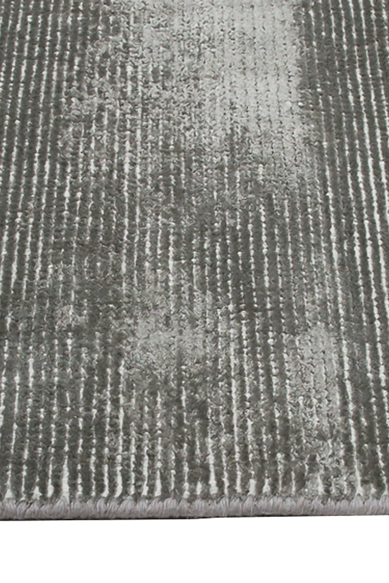 Close-up of Grey Elements Rug – handwoven wool and bamboo silk rug with textured cut-and-loop, hand-sheared finish.