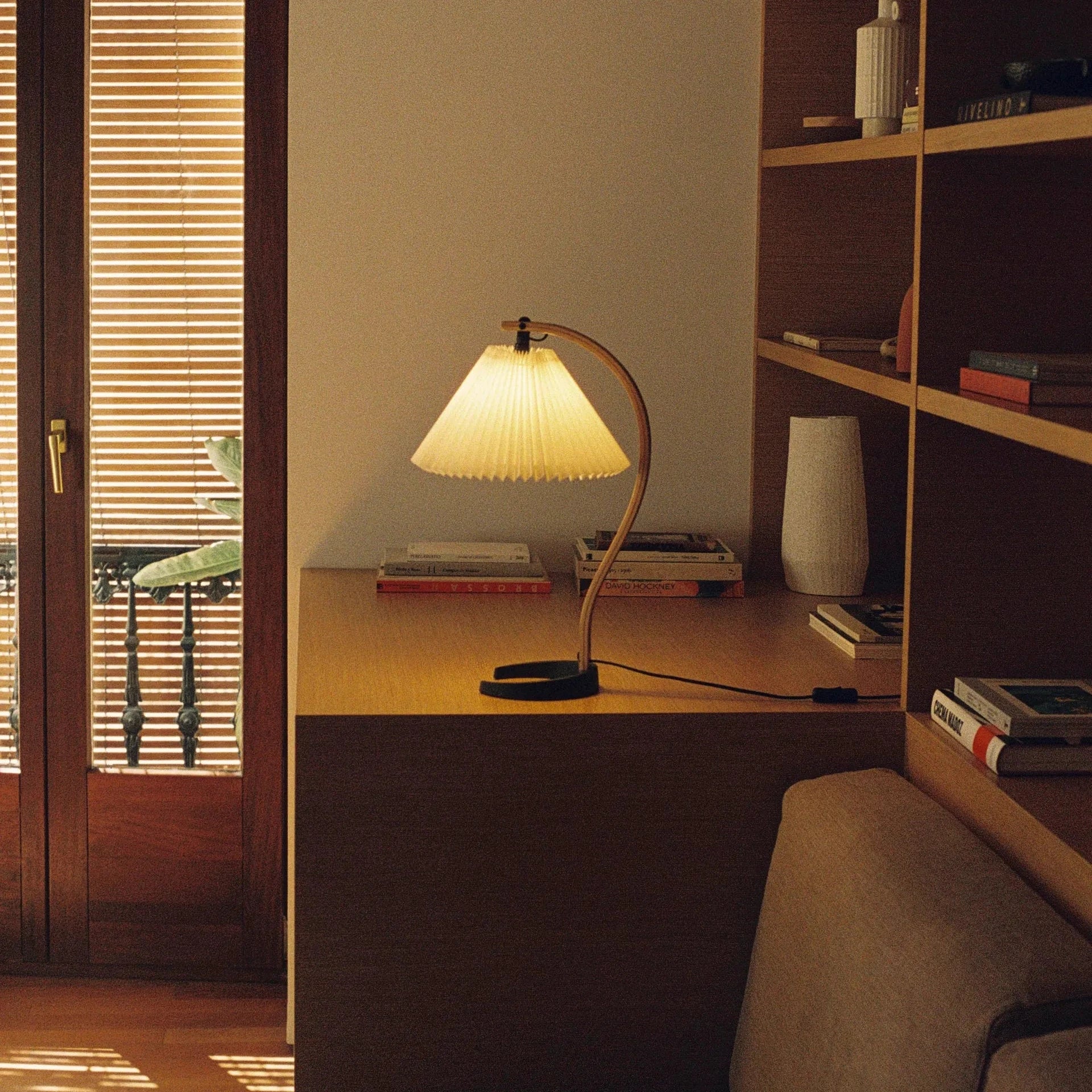 Gubi Timberline Table Lamp styled in a living room