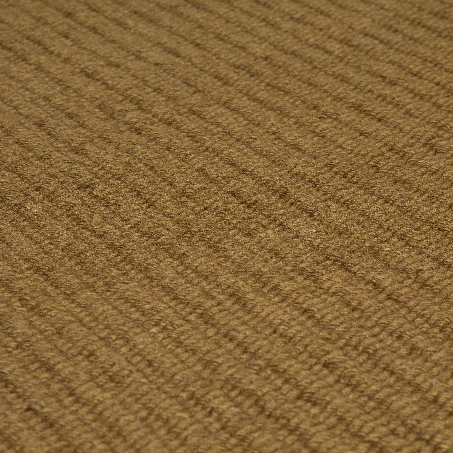 Pebble Flatweave Rug in Khaki – handwoven New Zealand wool flatweave with subtle pebble-like texture.
