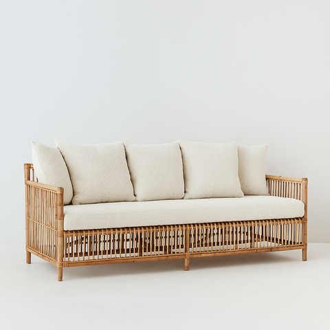 Lene Rattan Sofa featured in Louis Kit Boucle outdoor fabric