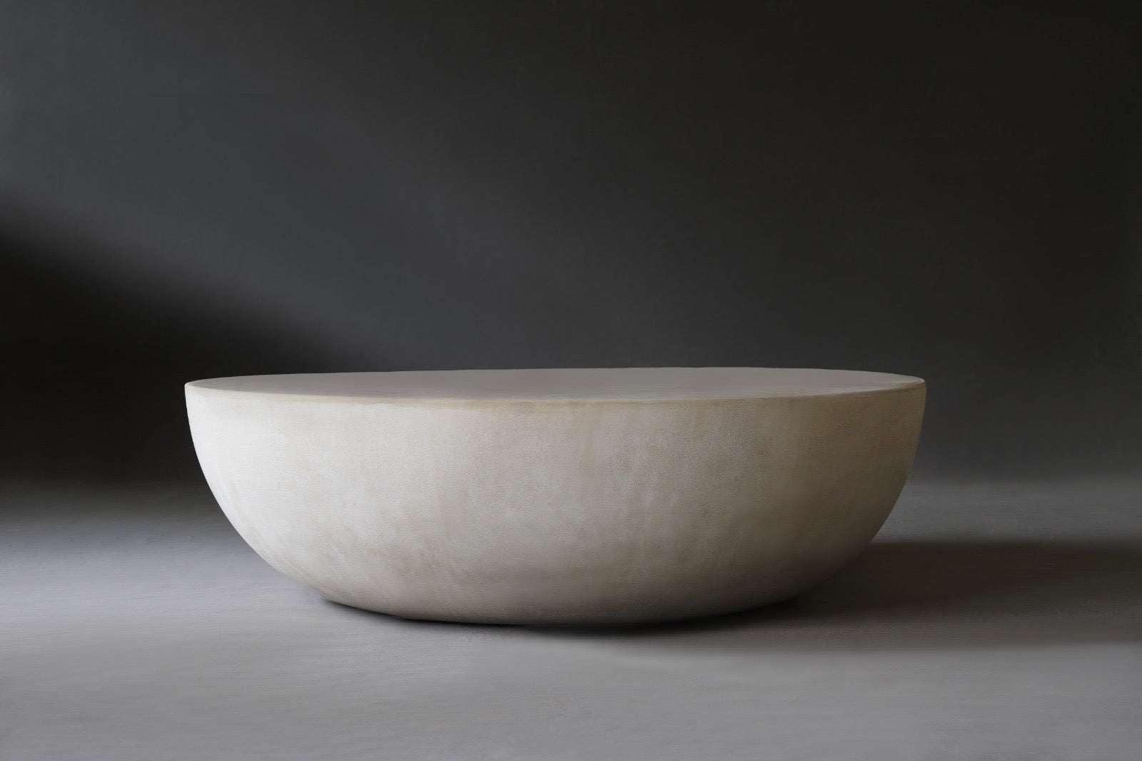 Front view of the Moon Coffee Table in 1200 Diameter in Oyster finish