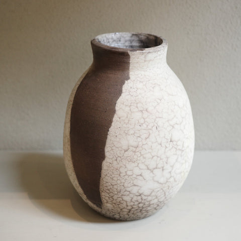 Contemporary ceramic vase crafted with naked raku firing technique