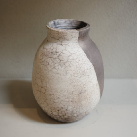 Handmade naked raku ceramic vase with smoky crackle surface by Jacqui Sosnowski