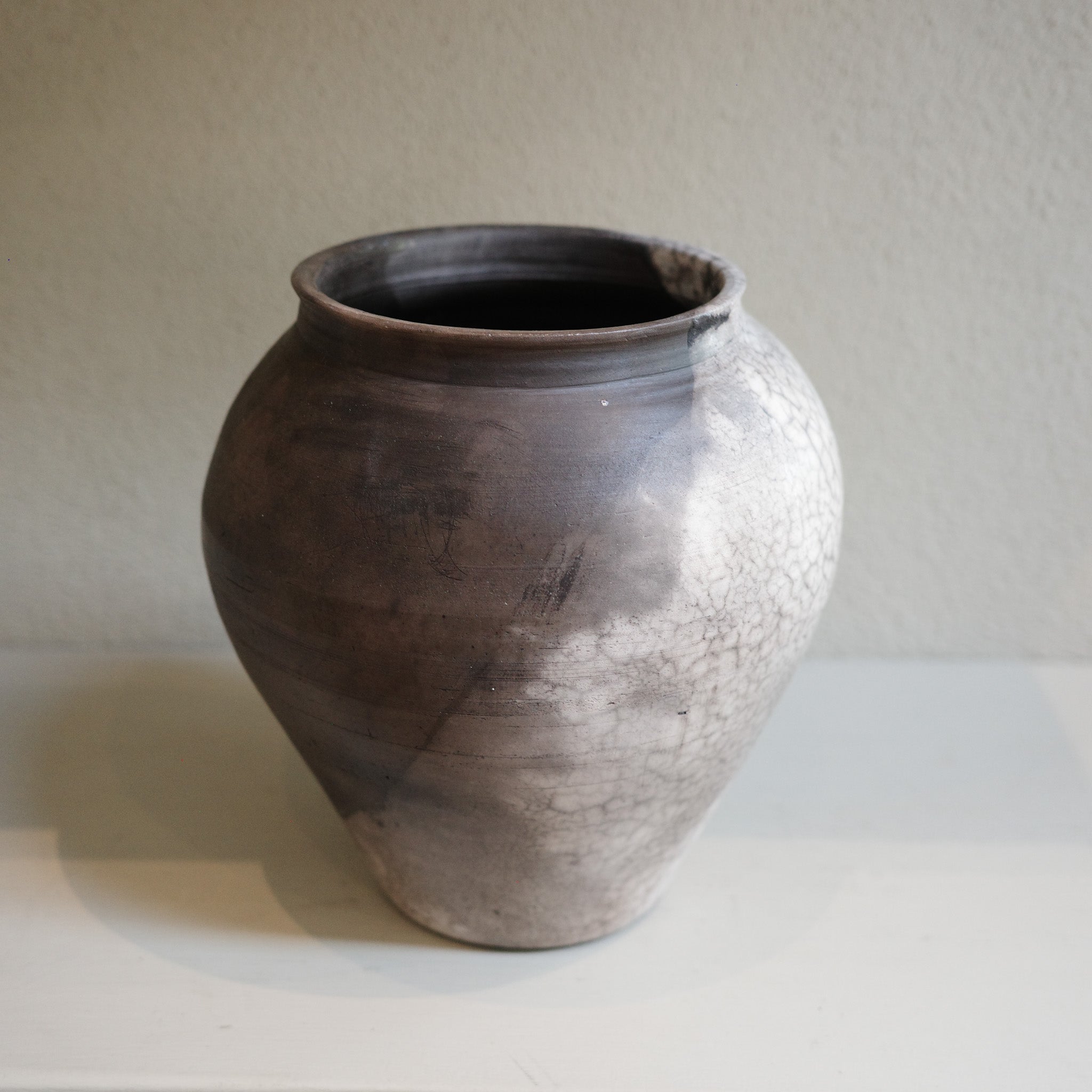 Large Naked Raku Vase – handmade ceramic with smoky black and white surface by Jacqui Sosnowski