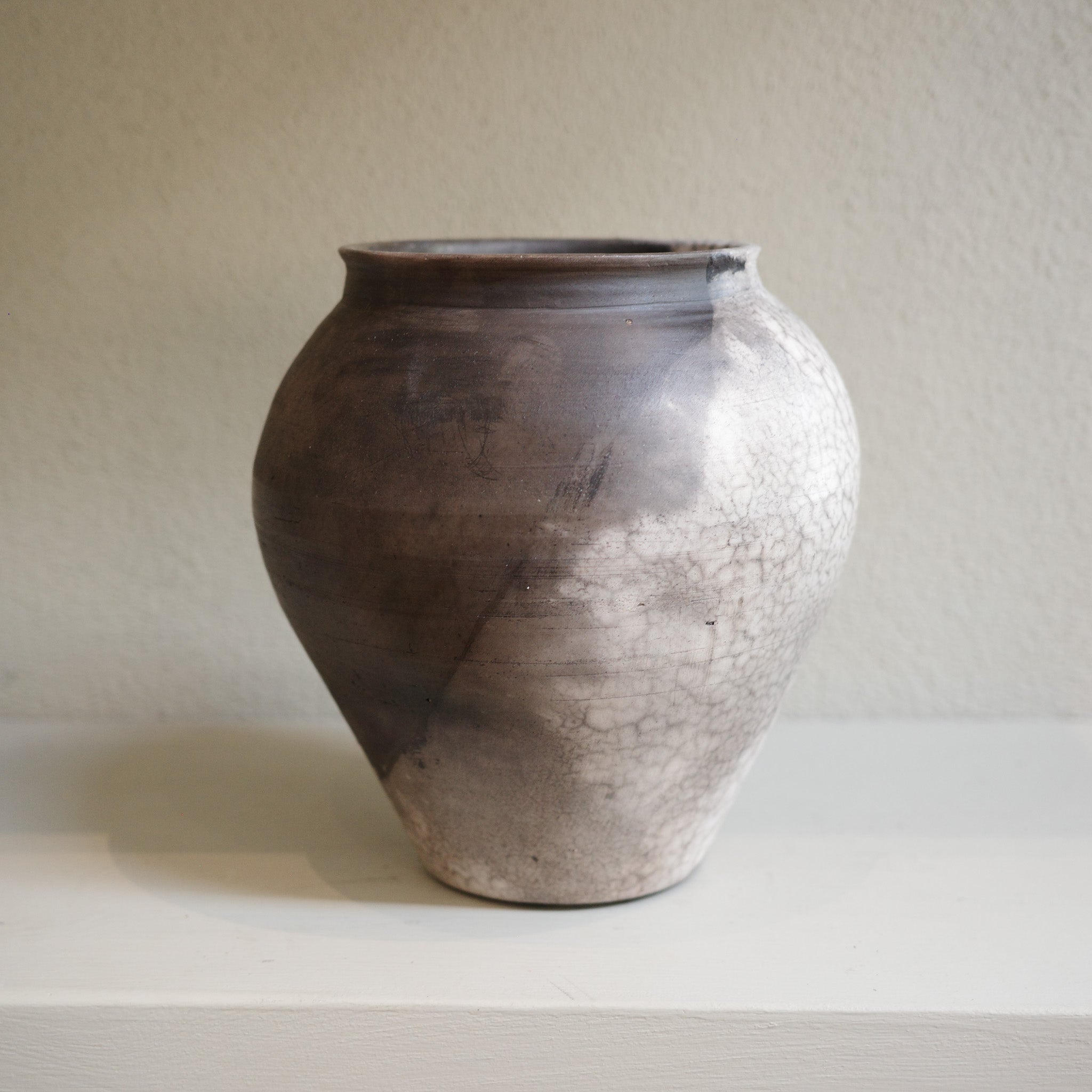 Large Naked Raku Vase – handmade ceramic with smoky black and white surface by Jacqui Sosnowski