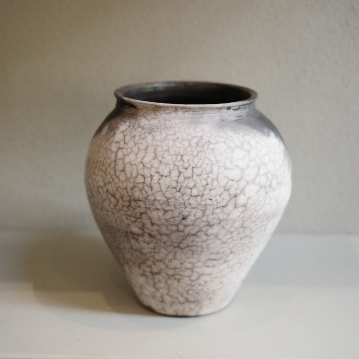 Large Naked Raku Vase – handmade ceramic with smoky black and white surface by Jacqui Sosnowski