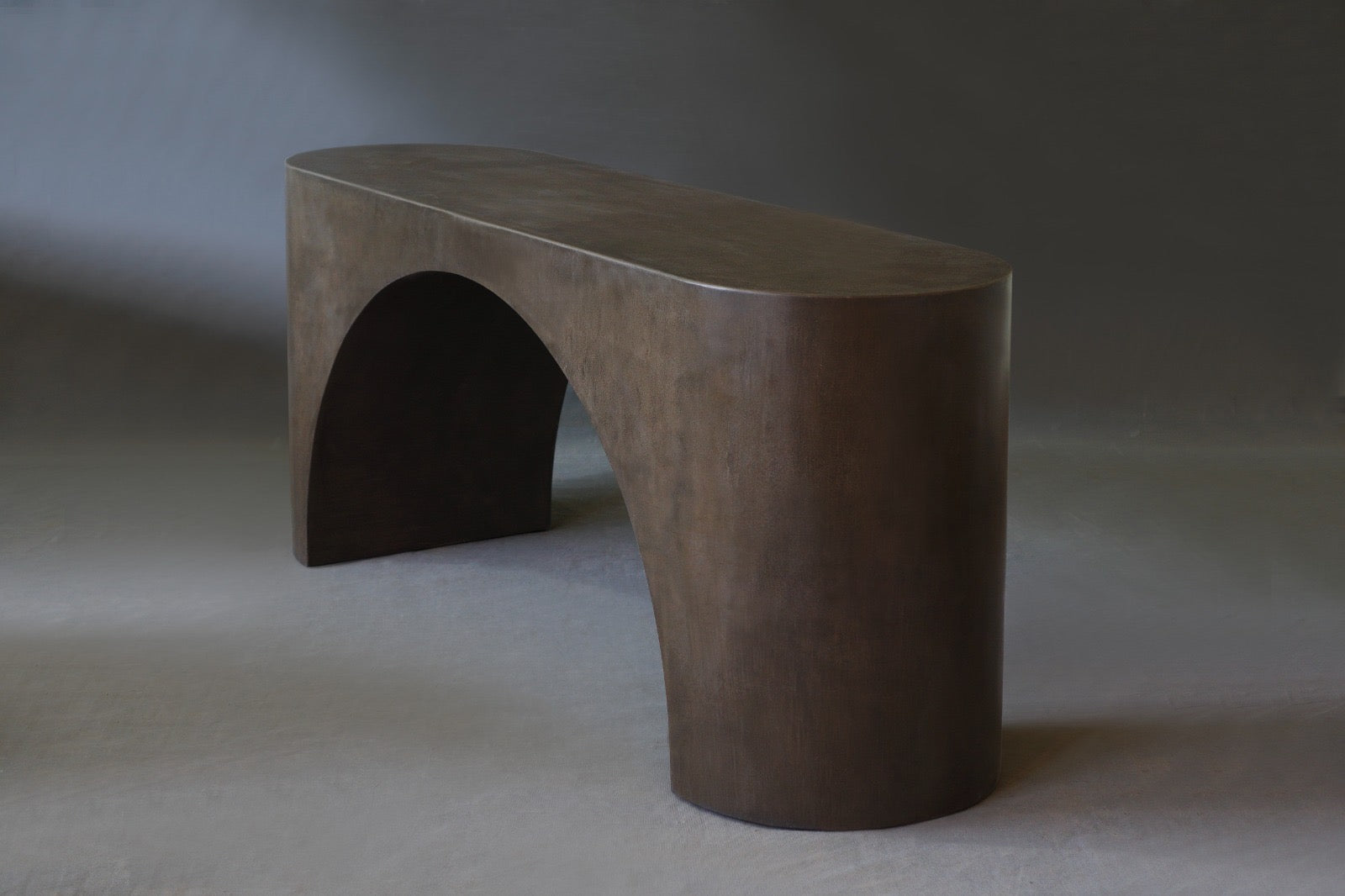 Side view of the Nova Console Table in Pebble micro cement finish, 1200 mm length, highlighting its sleek design and smooth texture
