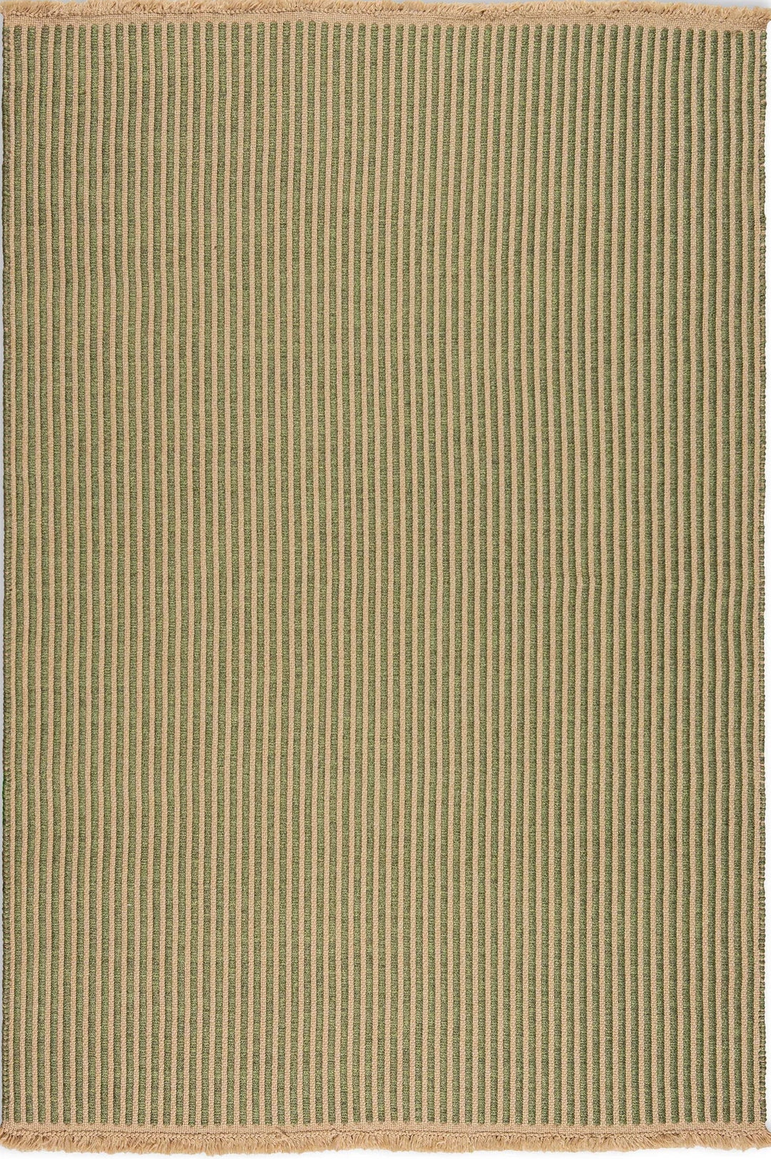 Full view of green ribbed outdoor rug with natural fringe edge