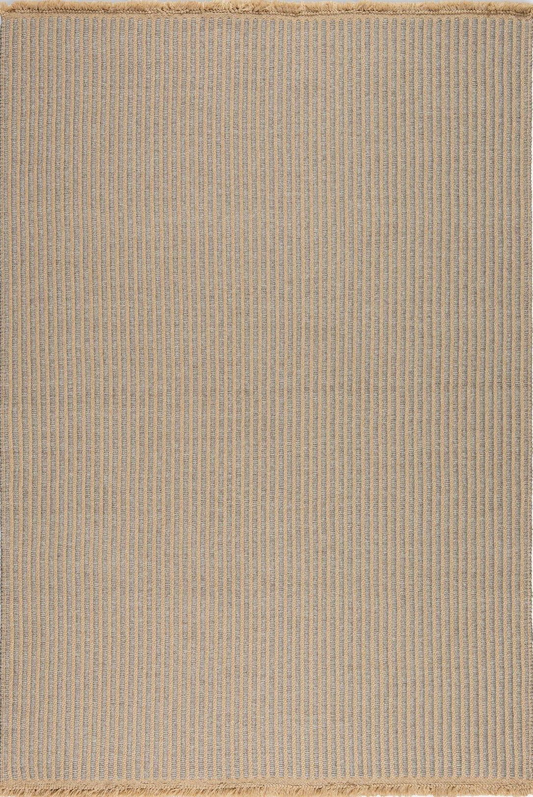 Full view of grey ribbed outdoor rug with natural fringe edge