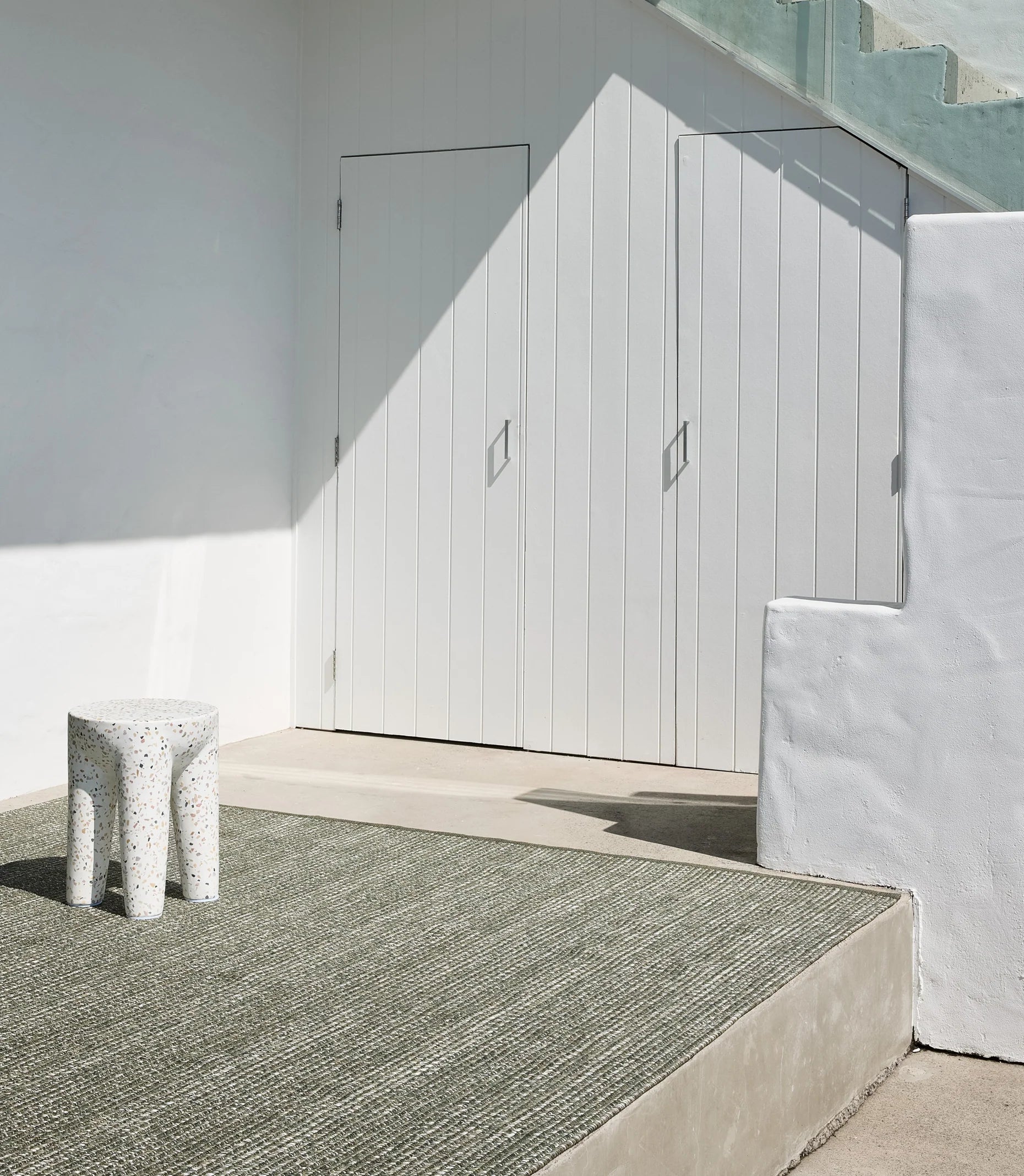 Seasons Natural Khaki Stripe Rug in outdoor area